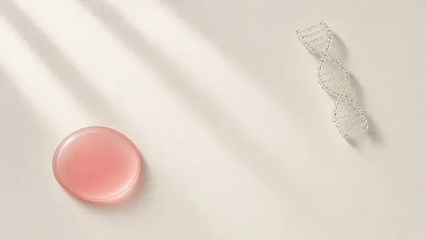 A pink gel swatch beside a translucent twisted strand suggesting DNA